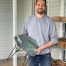 American Stonecraft owner, Gerald Croteau, models a Table with Shaker Village Slab
