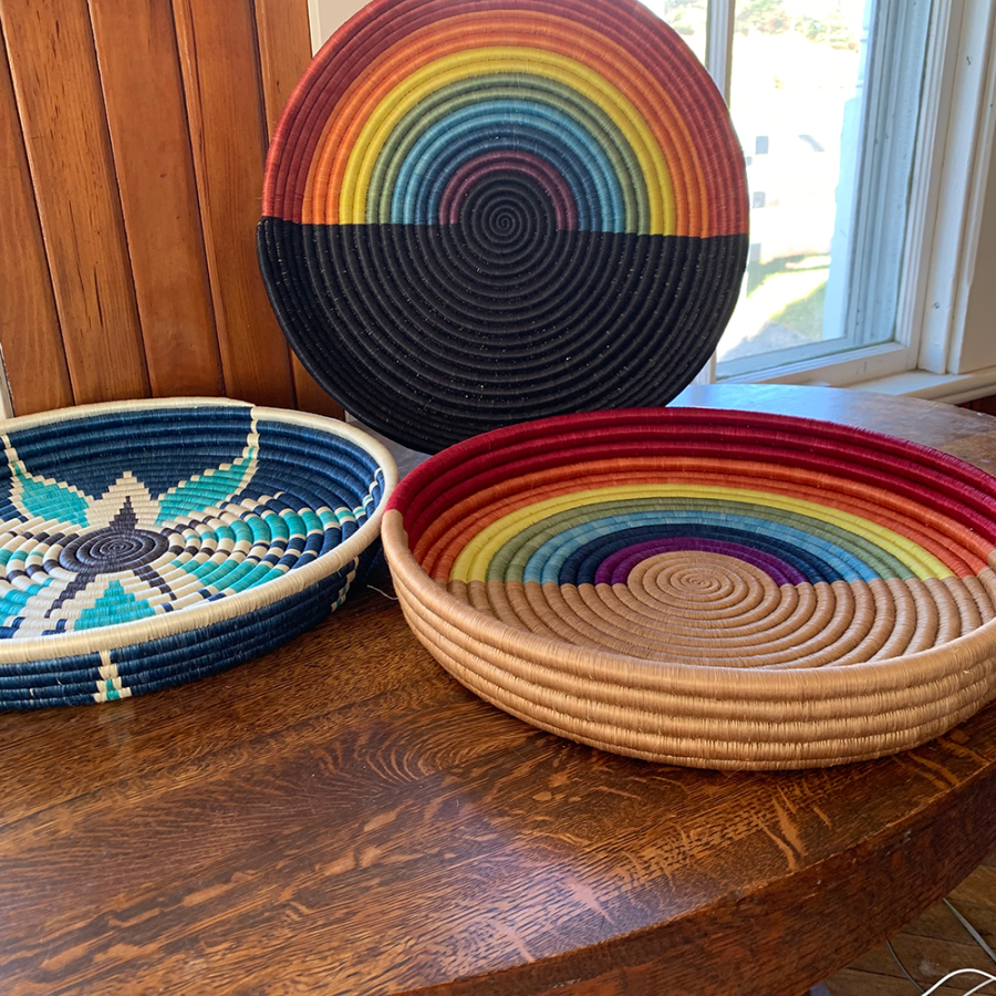 Handmade woven tray baskets by Ange Muhorakeye